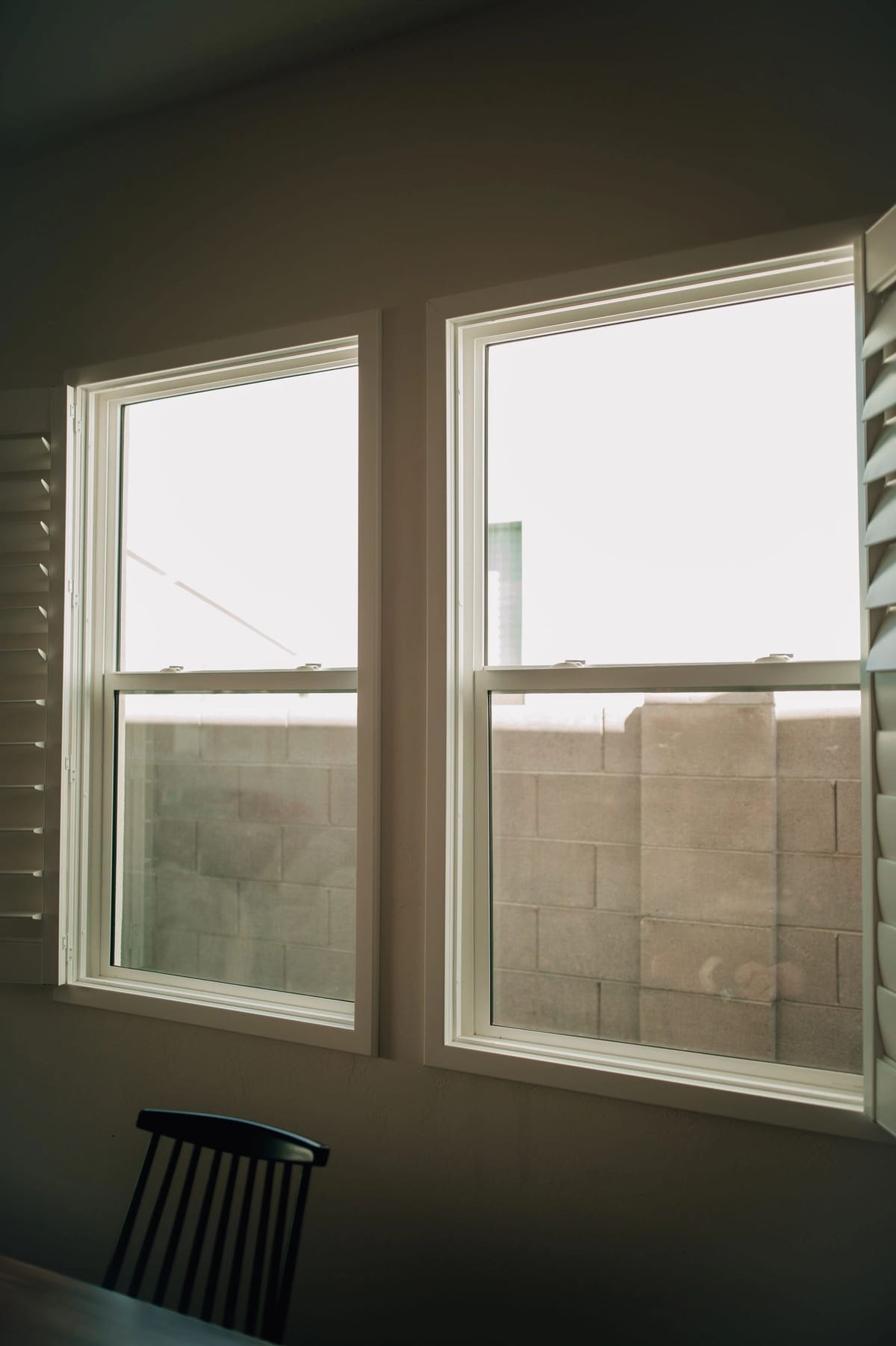 Clean exterior window with screen removed for detailing